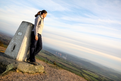 Woman standing at the top of The Wrekin